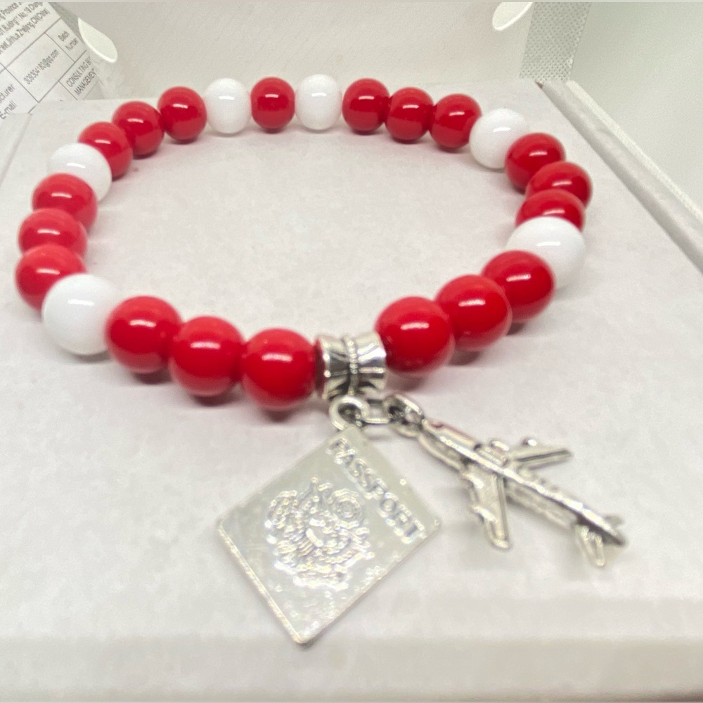 Red and White Beaded Bracelet with Charms
